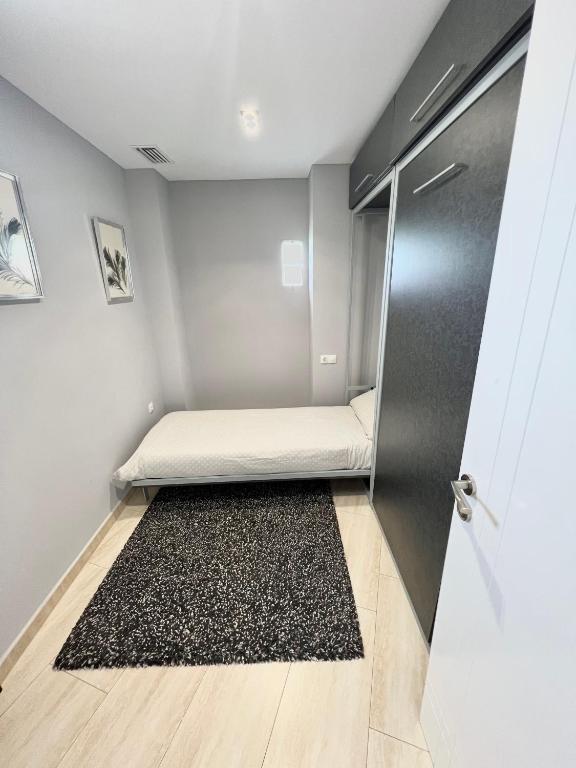 Postel nebo postele na pokoji v ubytování El Pont Alicante Apartments