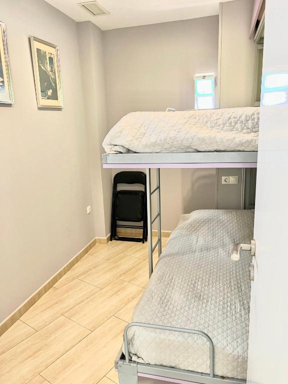 Postel nebo postele na pokoji v ubytování El Pont Alicante Apartments