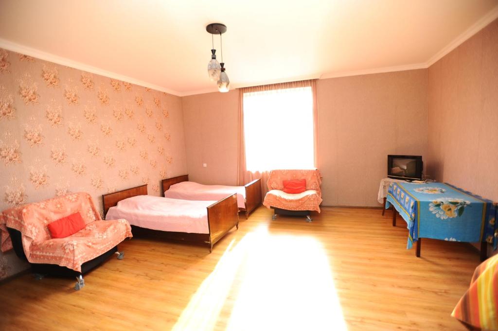 Postel nebo postele na pokoji v ubytování chelo