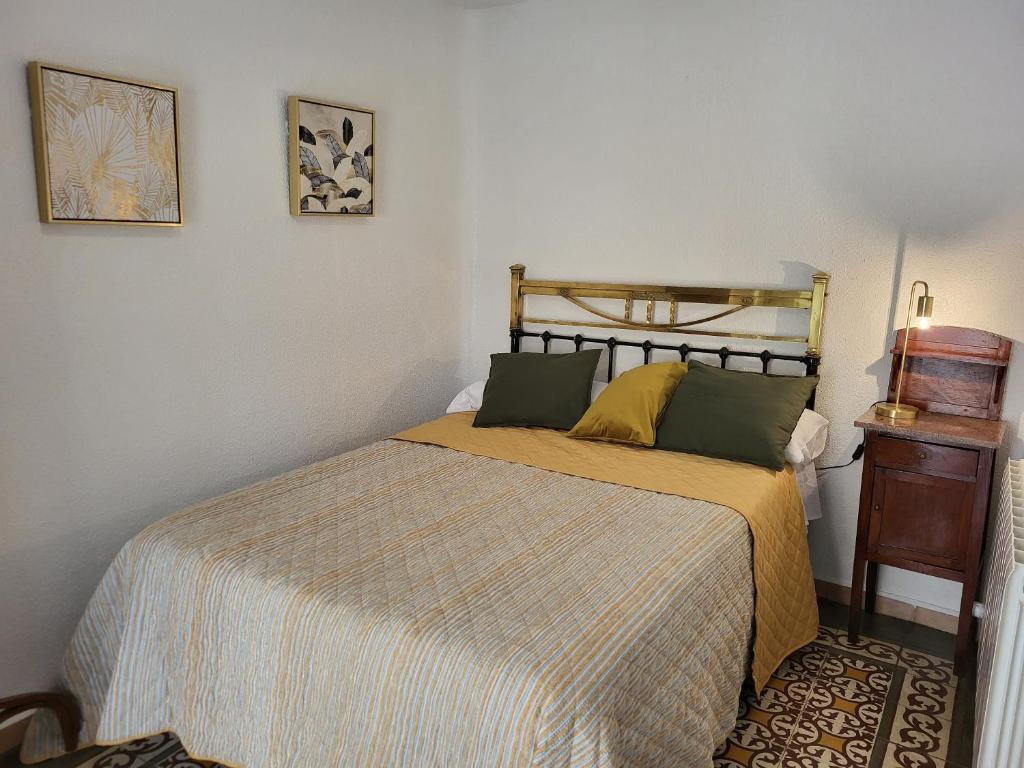 Postel nebo postele na pokoji v ubytování Casa Santa María 2 con jardín y barbacoa