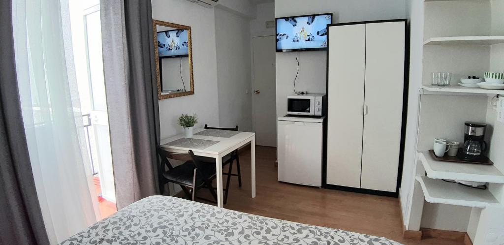 Kuchyň nebo kuchyňský kout v ubytování Hostal Nevada