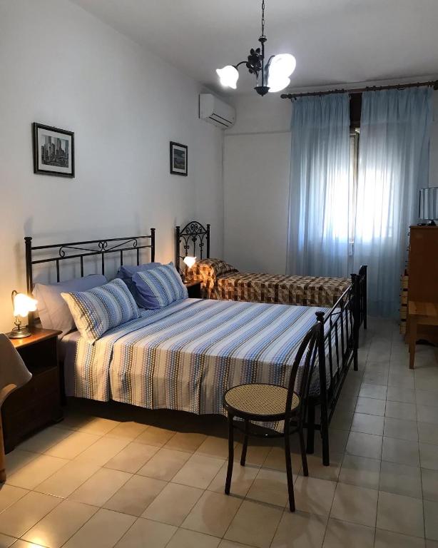 Postel nebo postele na pokoji v ubytování Albergo Europa