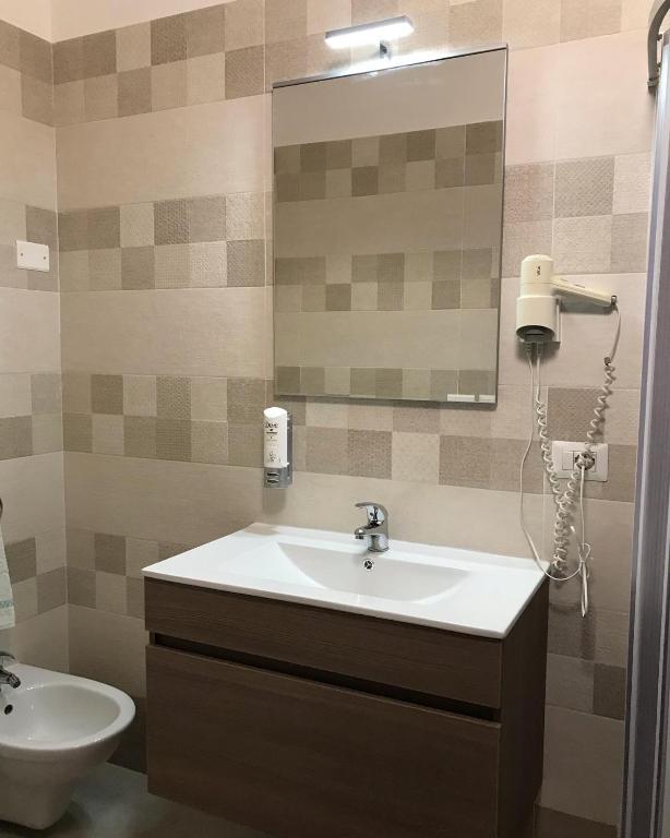 Koupelna v ubytování Albergo Europa