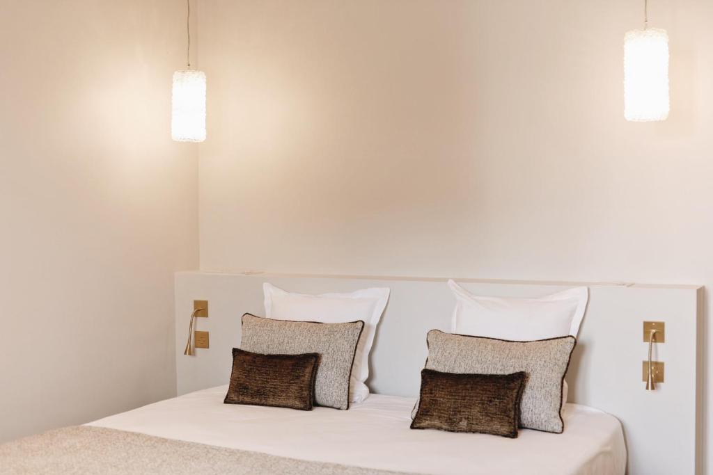 Postel nebo postele na pokoji v ubytování Hotel San Carlu Citadelle Ajaccio