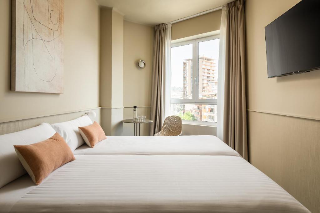 Postel nebo postele na pokoji v ubytování BYPILLOW The Bloom