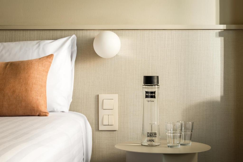 Postel nebo postele na pokoji v ubytování BYPILLOW The Bloom
