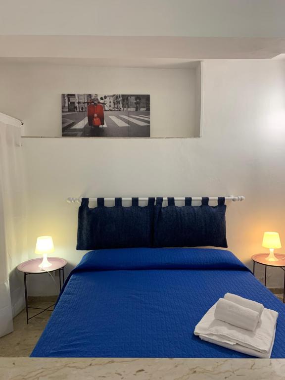 Posteľ alebo postele v izbe v ubytovaní Residence Guidaloca