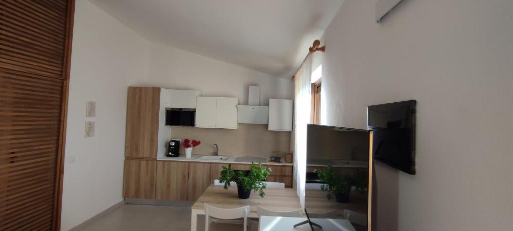 A kitchen or kitchenette at San Teodoro - Salina Bamba