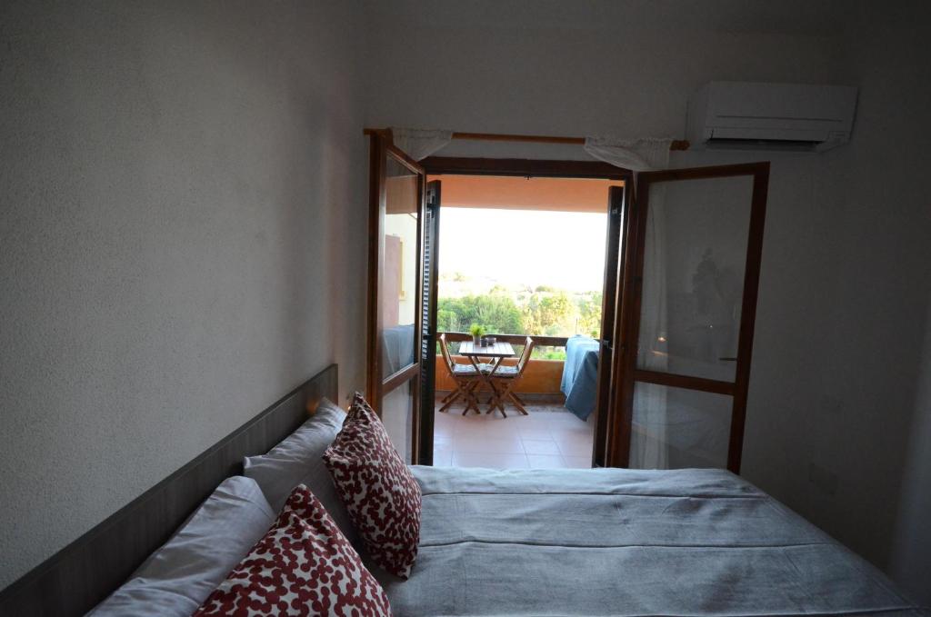 A bed or beds in a room at San Teodoro - Salina Bamba