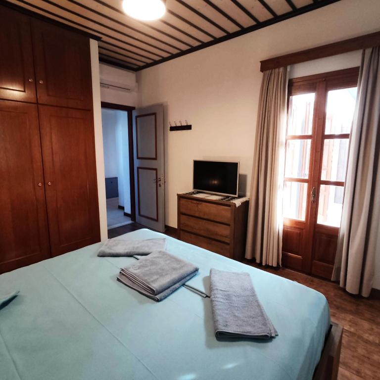 Posteľ alebo postele v izbe v ubytovaní Vrionis House