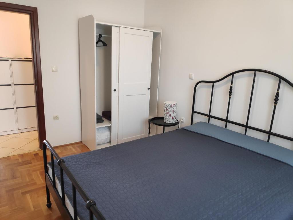 Postel nebo postele na pokoji v ubytování Apartman Ema