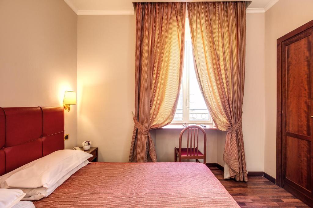 Posteľ alebo postele v izbe v ubytovaní Hotel Villafranca