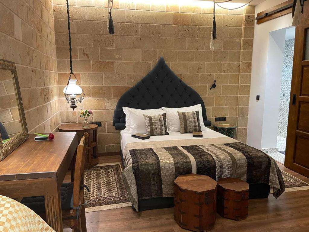 Postel nebo postele na pokoji v ubytování Utopia Luxury Suites - Old Town