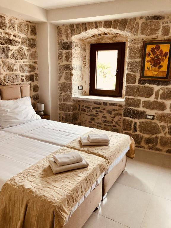 Postel nebo postele na pokoji v ubytování Guesthouse Giraffe