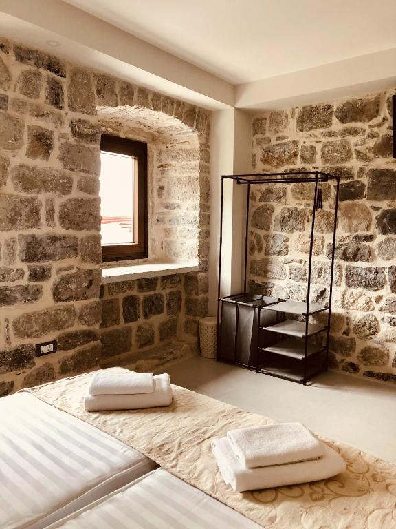 Postel nebo postele na pokoji v ubytování Guesthouse Giraffe