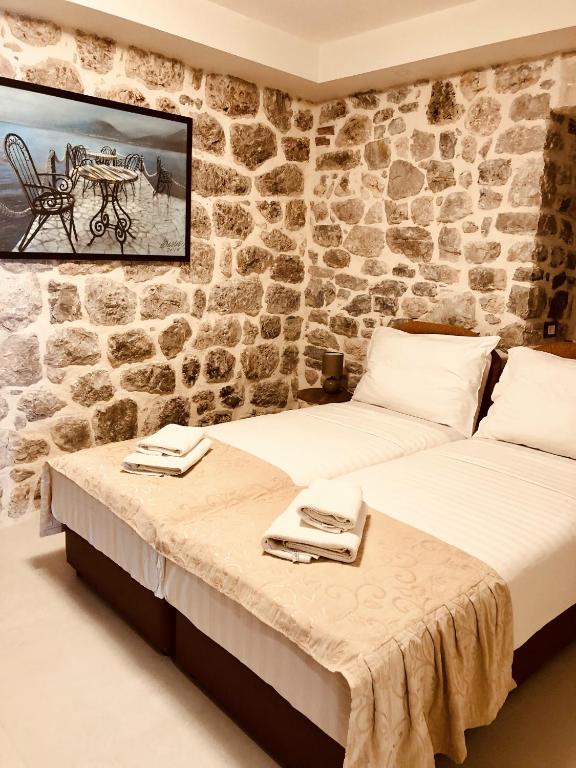 Postel nebo postele na pokoji v ubytování Guesthouse Giraffe