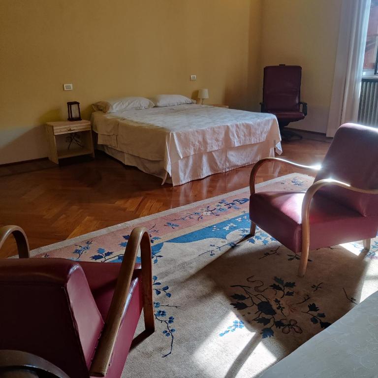 Postel nebo postele na pokoji v ubytování Villa Ghia