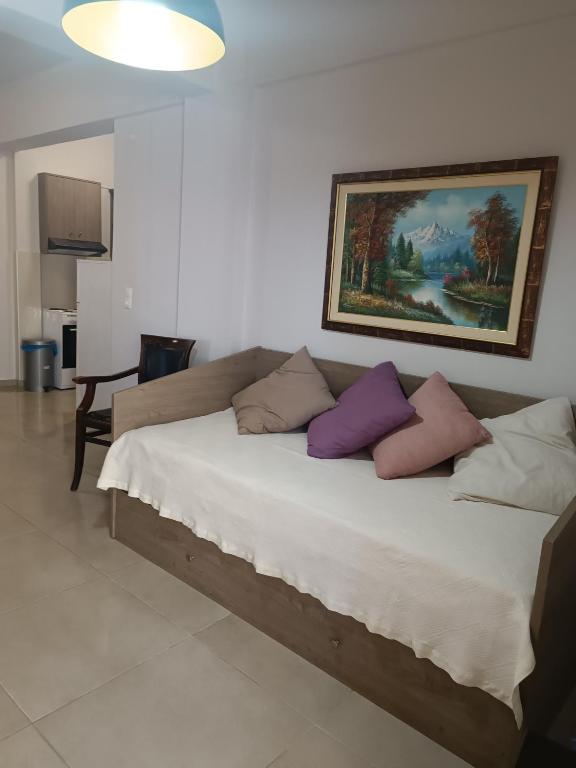 Ein Bett oder Betten in einem Zimmer der Unterkunft Buganvilla Sea View apts