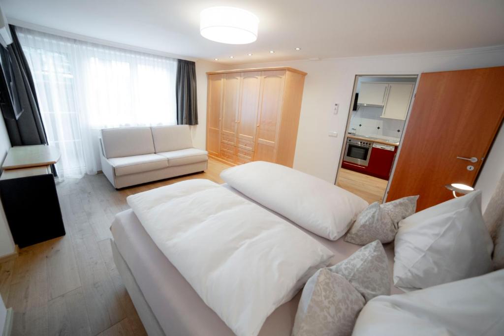 Posteľ alebo postele v izbe v ubytovaní Aparthotel Steger Wagrain