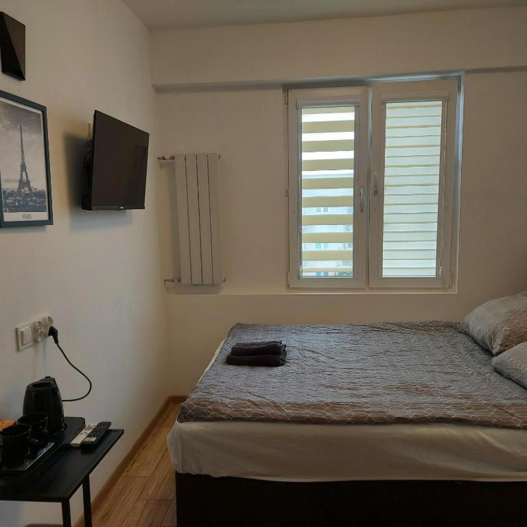 Posteľ alebo postele v izbe v ubytovaní Apartament MIRA