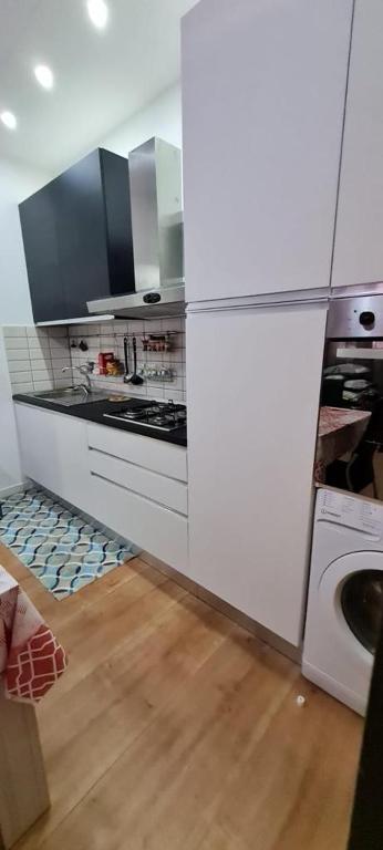 Kuchyňa alebo kuchynka v ubytovaní Piazza Colombo-Apartments