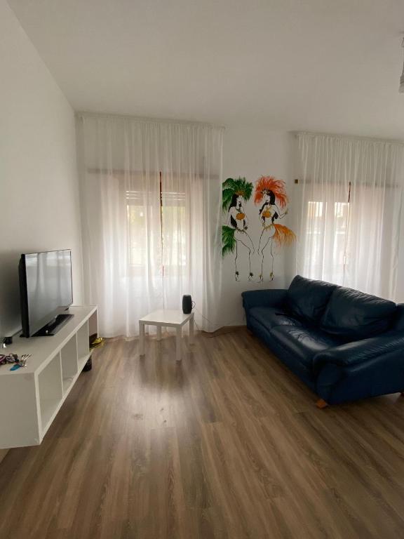 Televízia a/alebo spoločenská miestnosť v ubytovaní La casa di Gianfry
