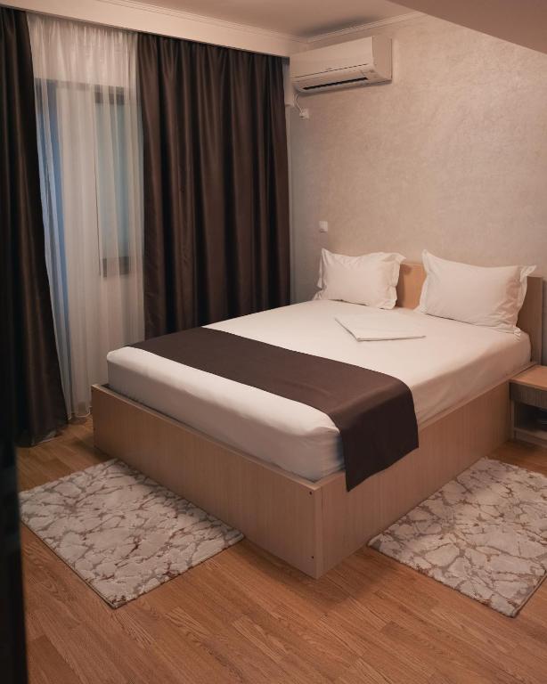 Postel nebo postele na pokoji v ubytování Delta Est Hotel & Restaurant