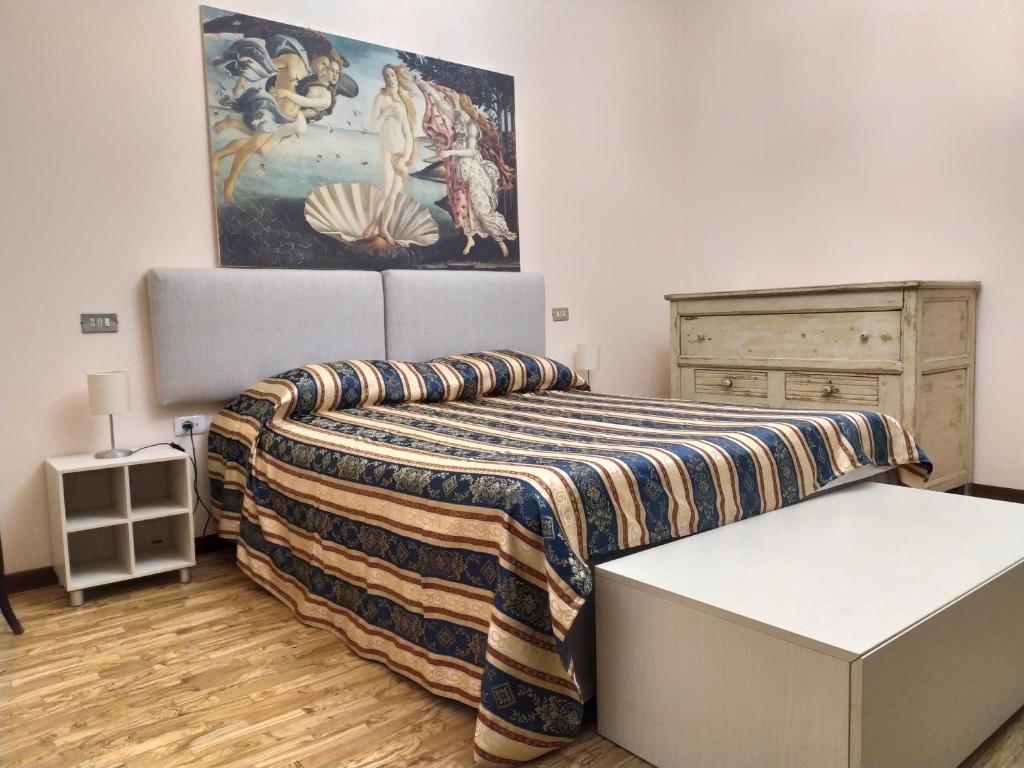 Postel nebo postele na pokoji v ubytování B&B MOLIN DEL TOPO
