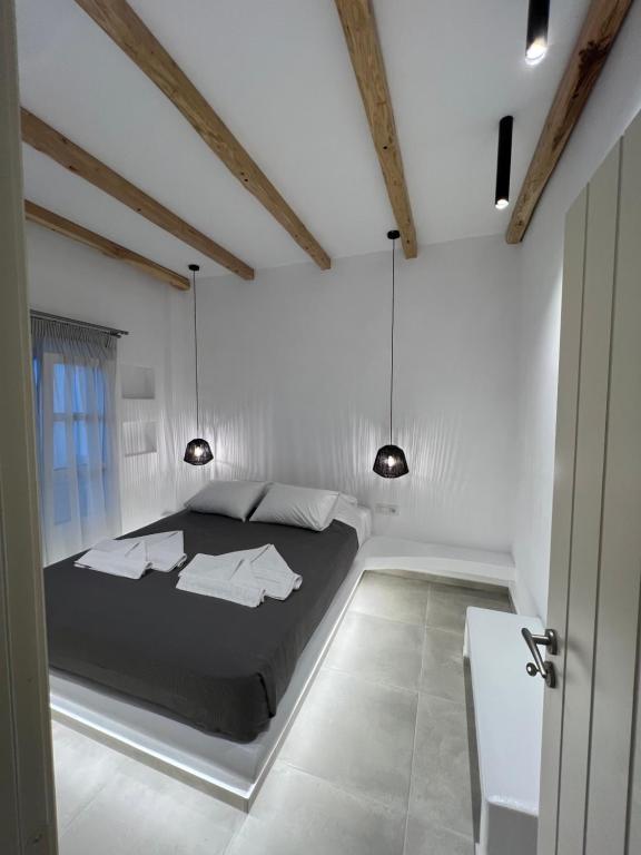 Postel nebo postele na pokoji v ubytování Alidian bay Suites Leros