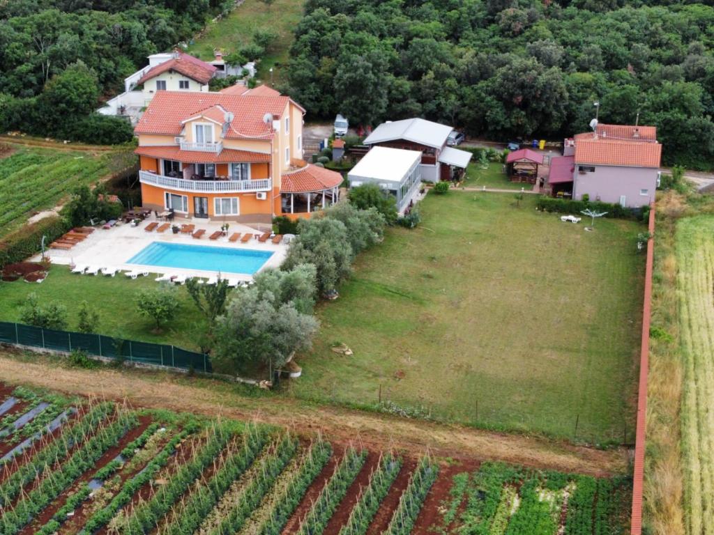 an aerial view of a house in a vineyard at Apartments Šeherzada in Pula