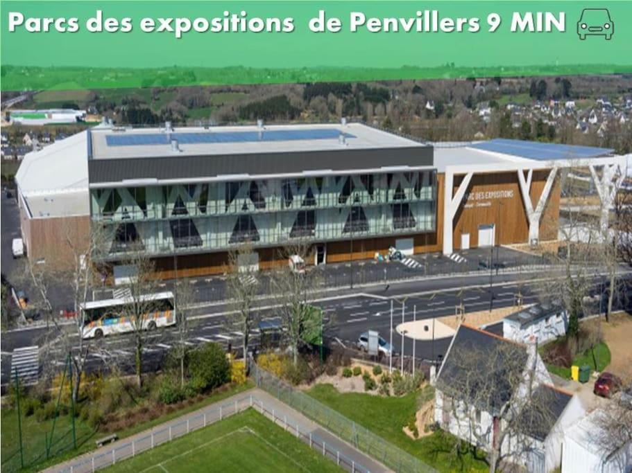 an image of a building with a parking lot at oo Le jardin oo paisible studio équipé et bien placé in Quimper