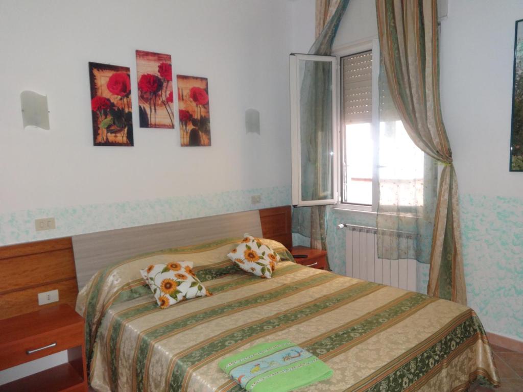 A bed or beds in a room at B&B Twins