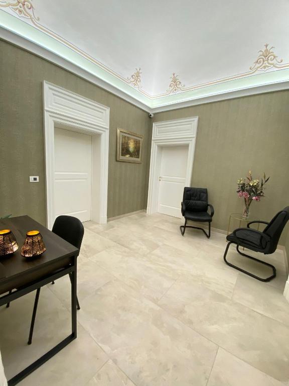 Posezení v ubytování M.Mansion