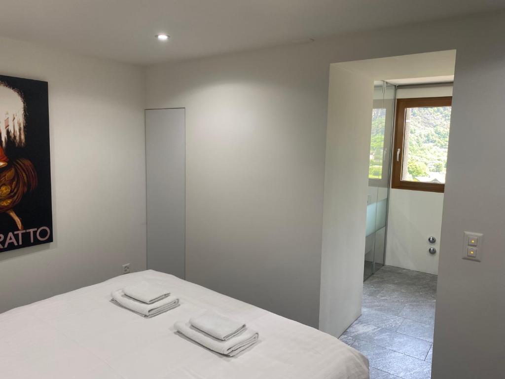 Postel nebo postele na pokoji v ubytování Casa Lele - Sole