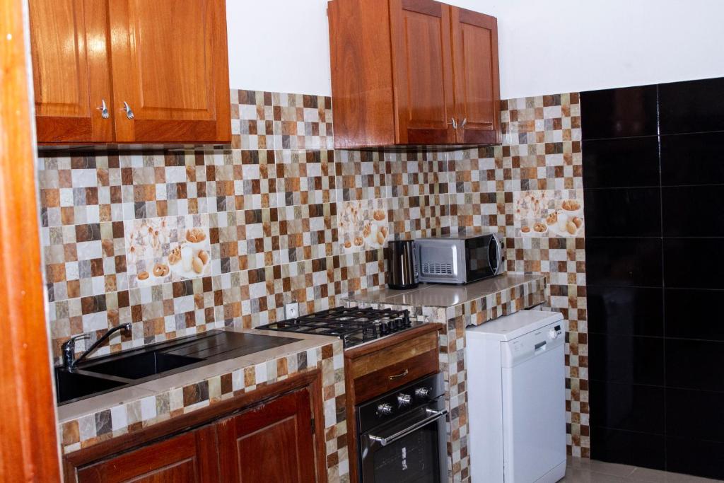 Kuchyň nebo kuchyňský kout v ubytování RESIDENCE rubis