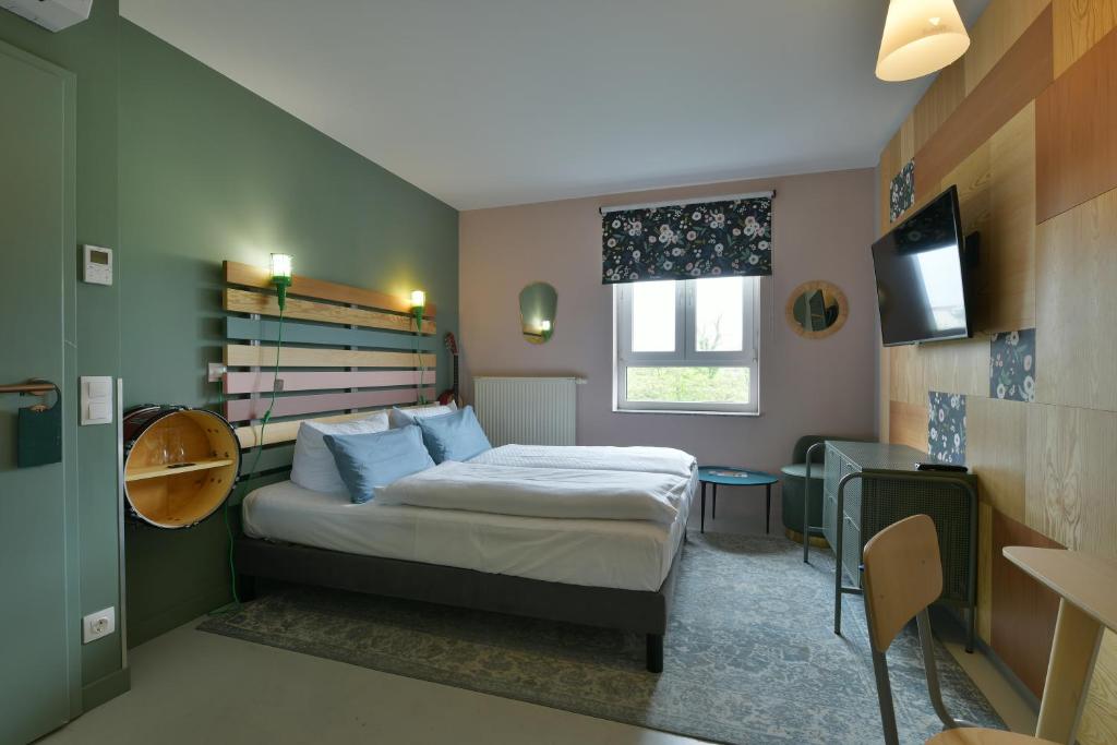 Postel nebo postele na pokoji v ubytování Hotel BIRGIT Berlin Mitte