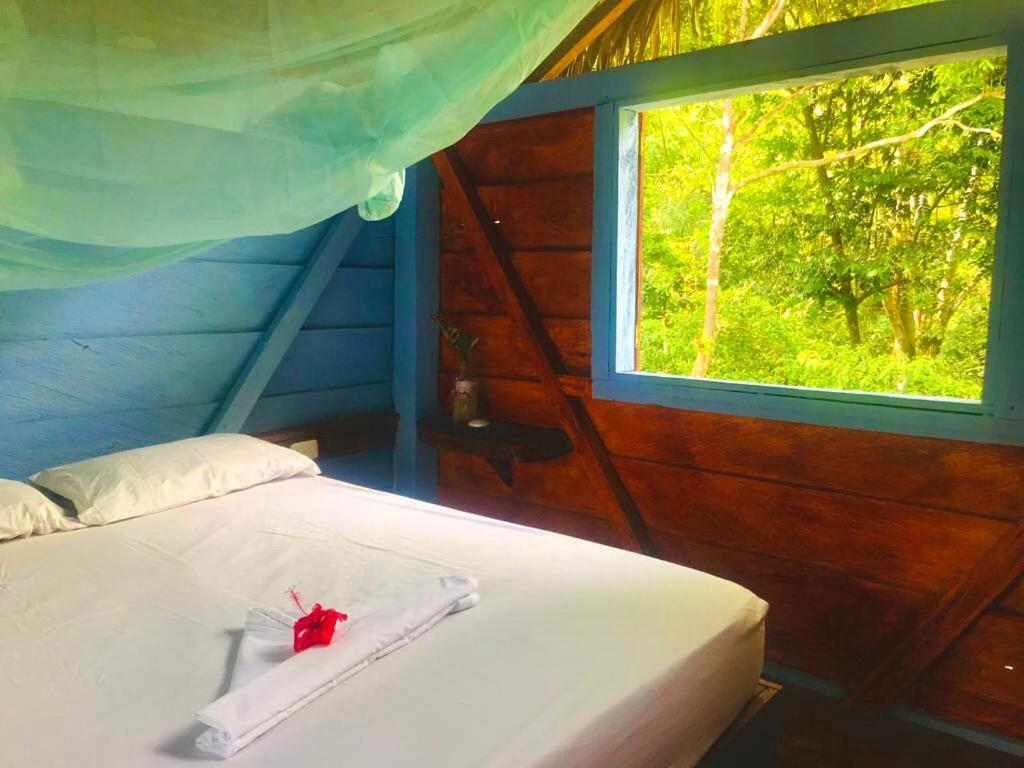 Postel nebo postele na pokoji v ubytování Hostal Doble Vista