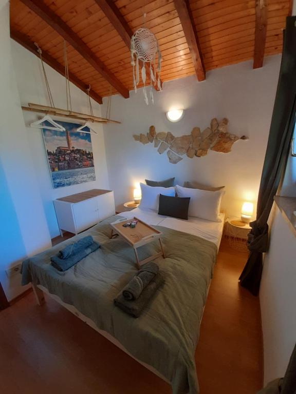 Una cama o camas en una habitación de Kuća Broda