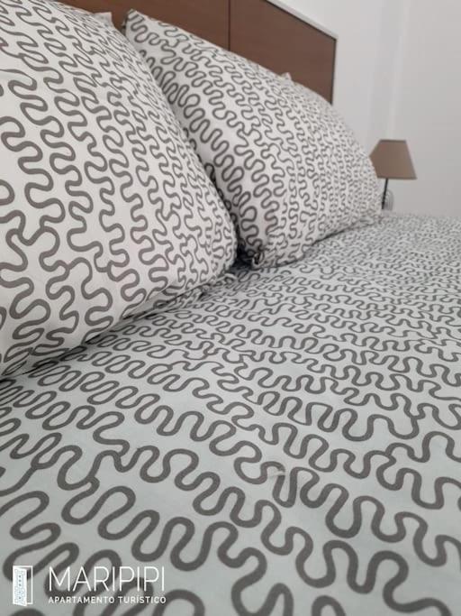 Postel nebo postele na pokoji v ubytování Apartamento maripipi