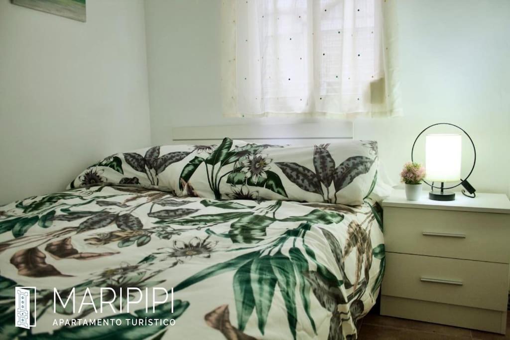 Postel nebo postele na pokoji v ubytování Apartamento maripipi