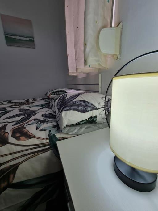Postel nebo postele na pokoji v ubytování Apartamento maripipi
