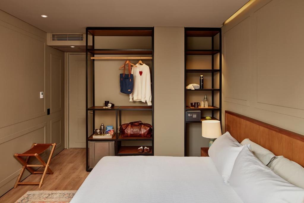 Postel nebo postele na pokoji v ubytování Hotel Coco