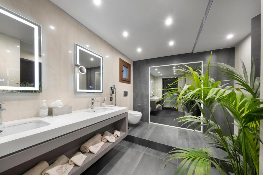 Łazienka w obiekcie Iakovakis Suites & Spa