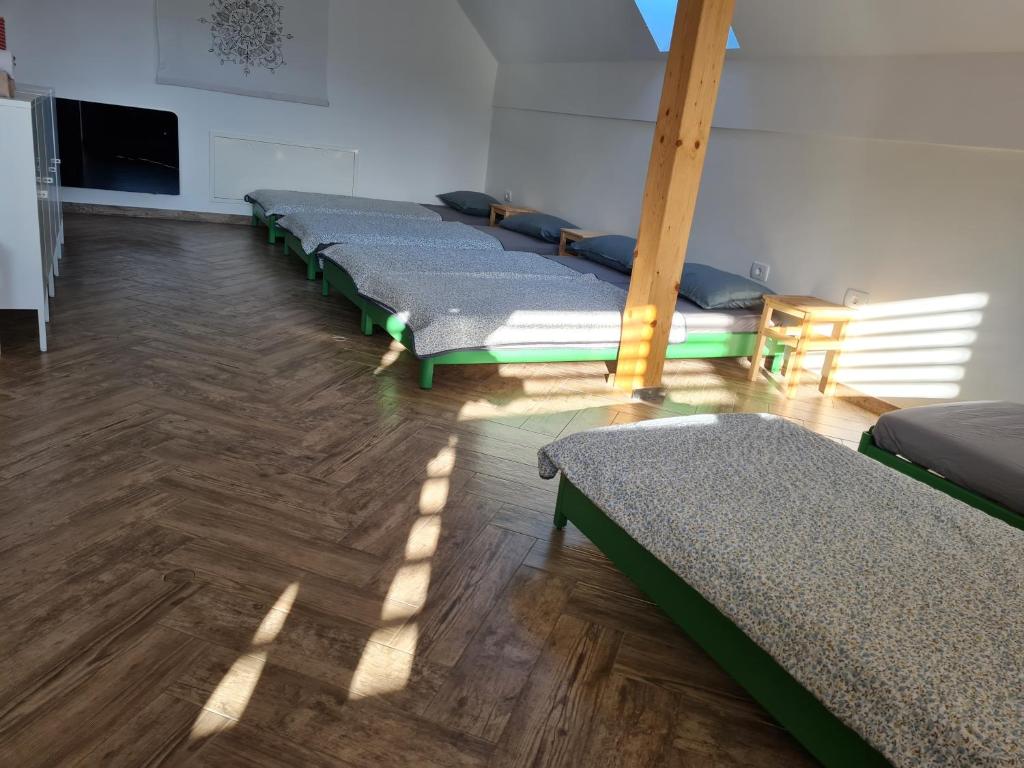 Postel nebo postele na pokoji v ubytování Nona BB