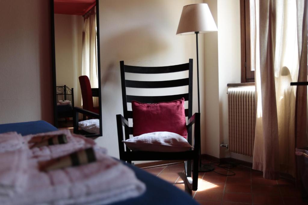 Postel nebo postele na pokoji v ubytování Albergo Rurale Parco di San Floriano
