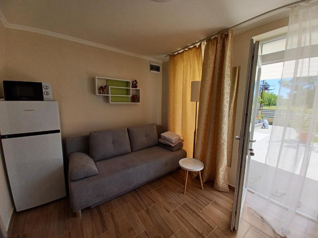 Kuchyň nebo kuchyňský kout v ubytování To8 apartman