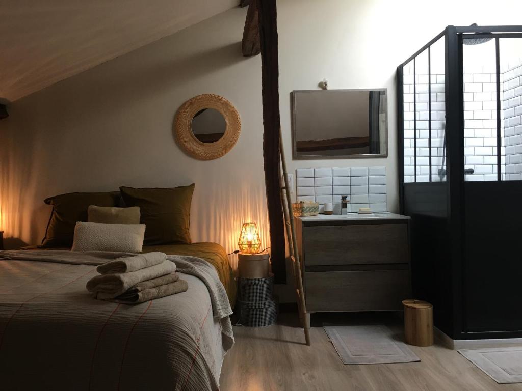 Postel nebo postele na pokoji v ubytování La Chartreuse