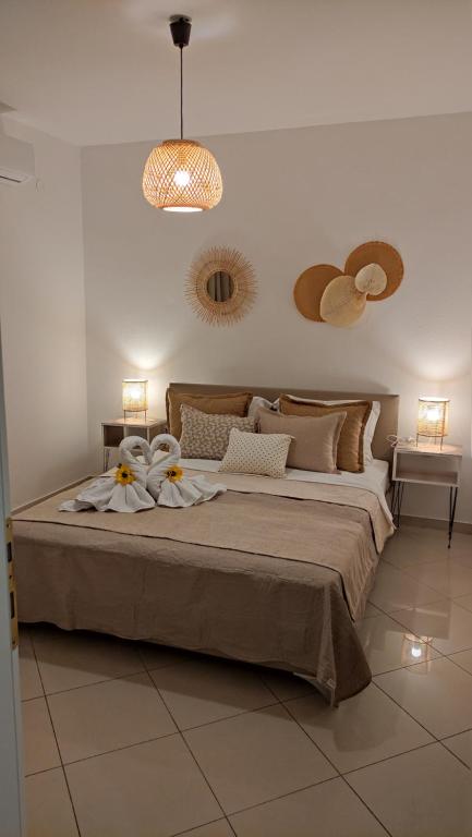 Posteľ alebo postele v izbe v ubytovaní Evris House oasis