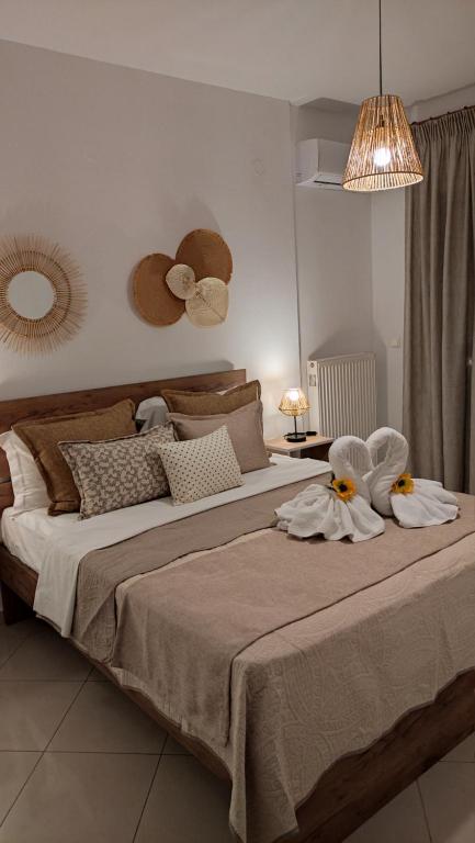 Posteľ alebo postele v izbe v ubytovaní Evris House oasis