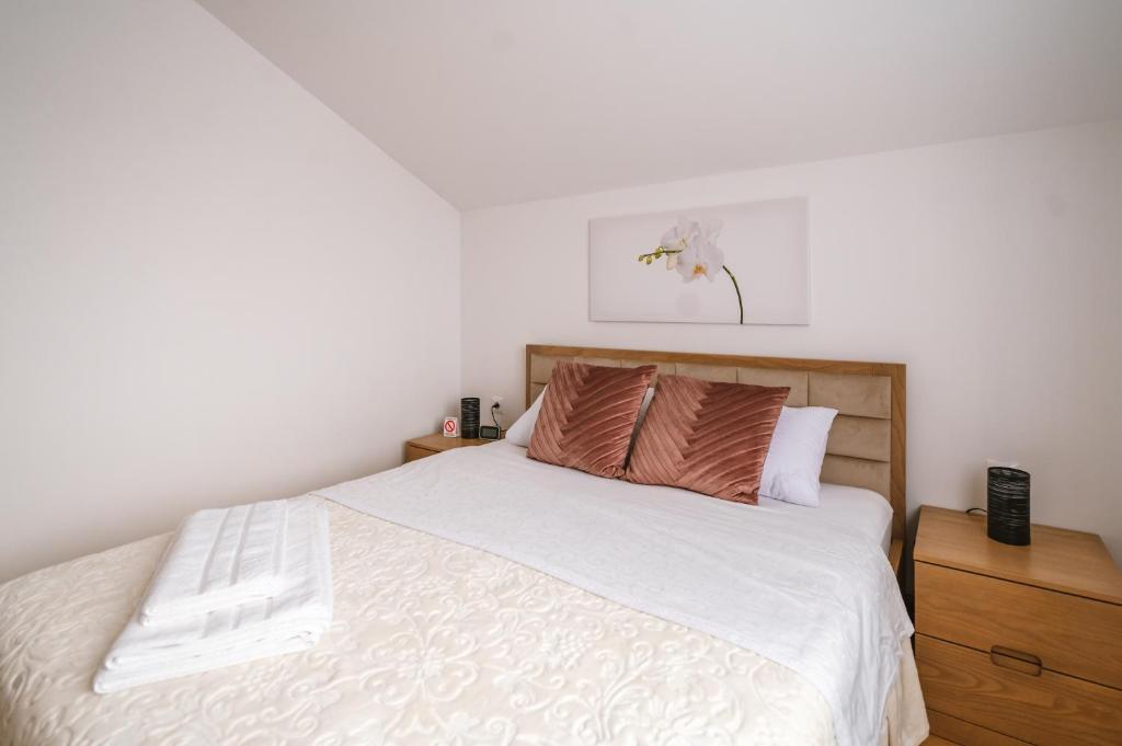 Postel nebo postele na pokoji v ubytování Mikonos apartman